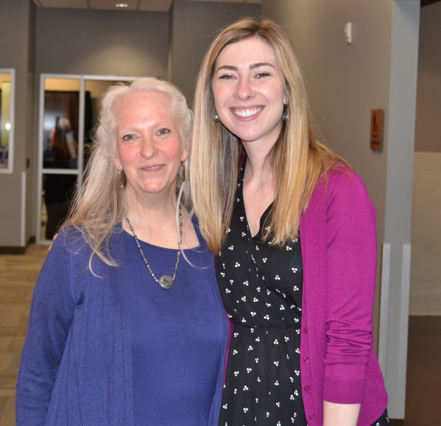 An Origami employee and volunteer pause for a photo at the 2019 Evening of Reflections event
