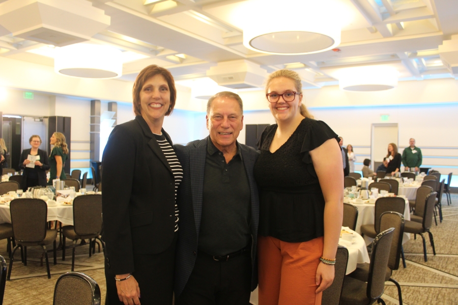 Ella along with her mom and Coach Tom Izzo at Origami's 2022 Unfolding Potential Breakfast