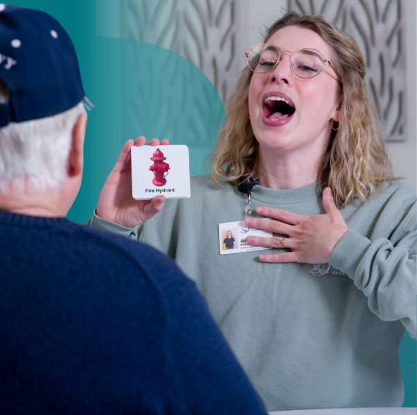 Origami Speech-language pathologist works with an adult client