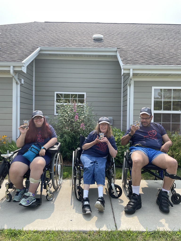 Origami residents have fun participating in the miracle baseball league through recreational therapy