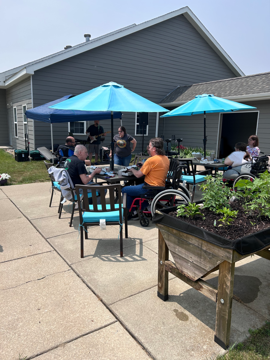 Origami residents enjoy a summer picnic on the patio