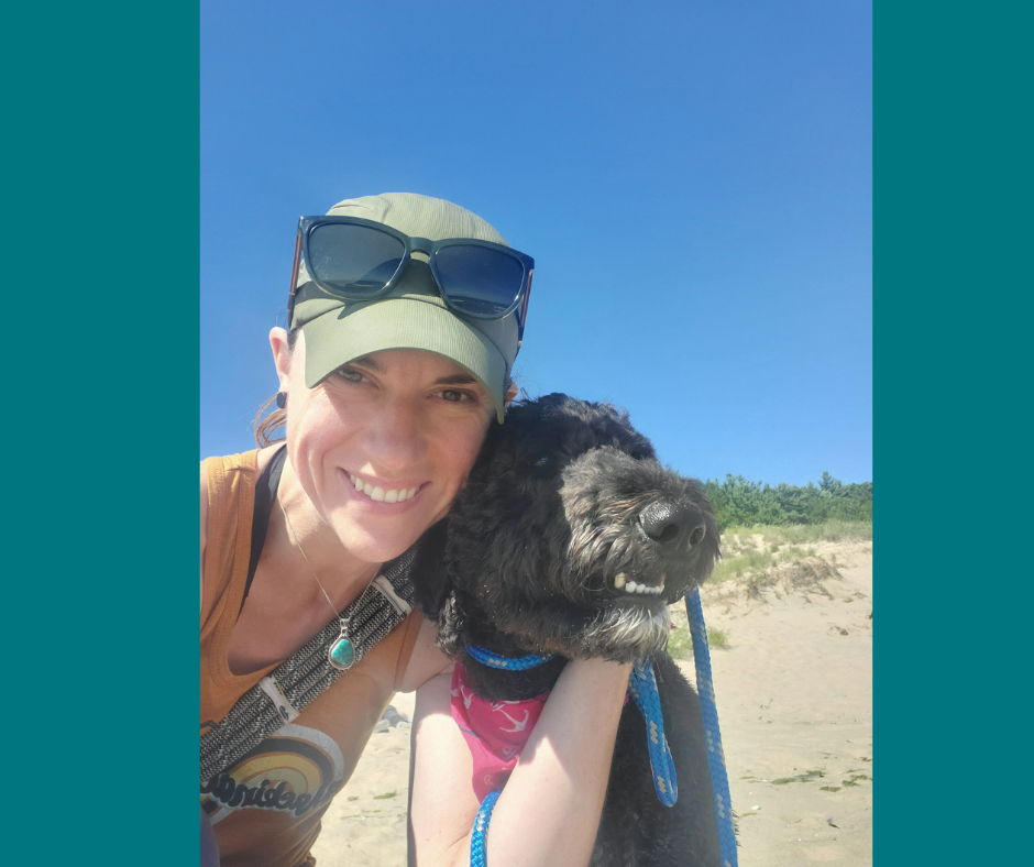 Sarah and her pup enjoying time at the beach