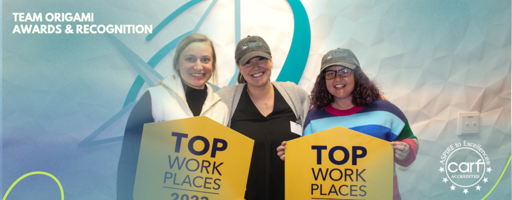 Team Members smile at Top Workplace Celebration